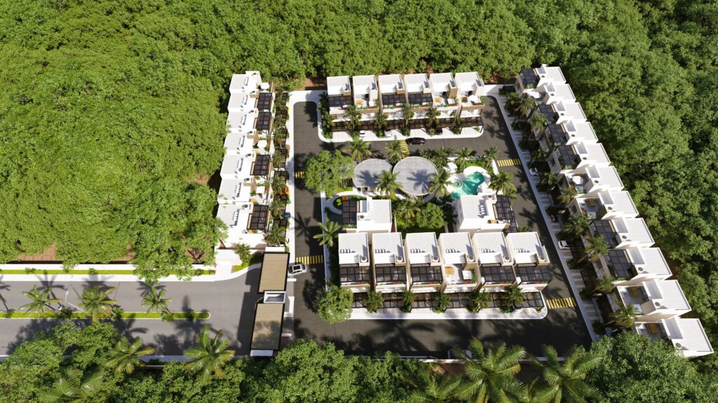 Vista aérea del desarrollo Evenus Playa del Carmen con casas en preventa rodeadas de naturaleza y áreas comunes con alberca.