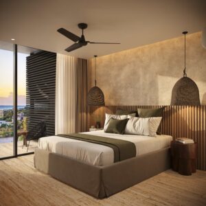 Fachada lateral de Terra Playa del Carmen, desarrollo residencial de lujo con diseño contemporáneo y detalles en piedra natural.