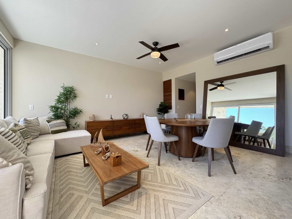 Sala comedor de departamento en Santamar Prime Akumal